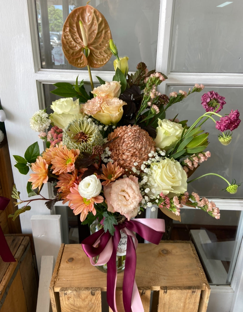 Blooms in A Rustic Vase