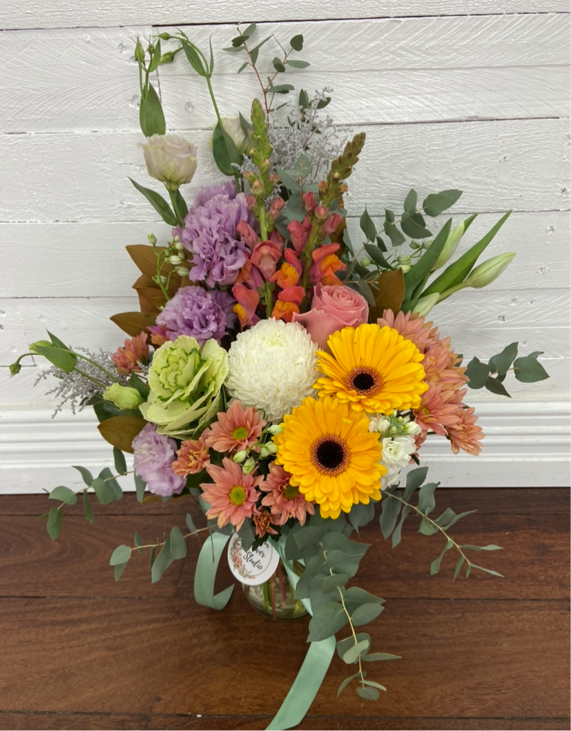 Blooms in A Rustic Vase